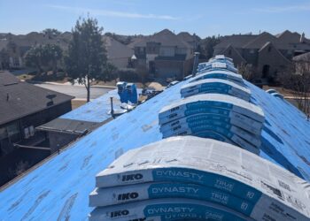 Project. Synthetic felt showing and class 3 impact resistant shingles showing_